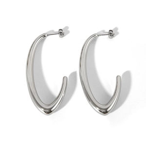 Macro view of silver geometric V-shaped earrings with polished stainless steel finish