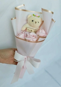 Pink soap rose bouquet with a crowned plush bear and a Happy Every Day wooden tag