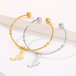 Adjustable celestial moon star and planet charms bangle bracelets in gold and silver finish