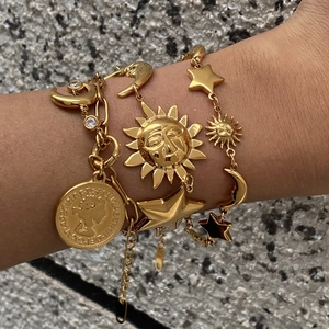 Layered 18k gold plated stainless steel bracelet set with star, moon and coin pendants