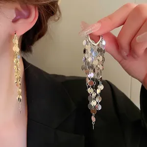 Exquisite gold sequin tassel earrings for women with a long metallic fringe design