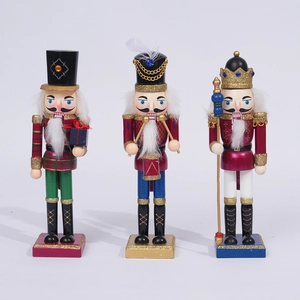 Detailed set of three 25cm wooden nutcracker soldiers for Christmas table decoration