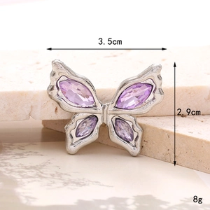 Detailed view of silver butterfly shoe charm with purple crystals and dimensions