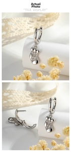 Détails des boucles d'oreilles chaussettes de Noël en argent avec zircons blancs micro-paves