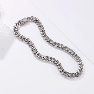 Polished silver cuban link chain for men featuring a sparkling iced-out diamond box clasp