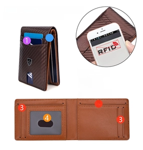 Detail of RFID blocking men's slim wallet with carbon fiber texture and card slots