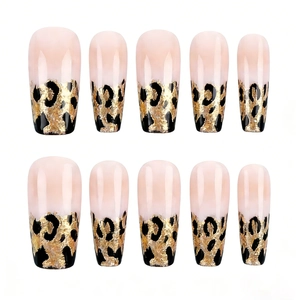Long coffin nails featuring leopard print French tips and gold foil accents in 10-piece set