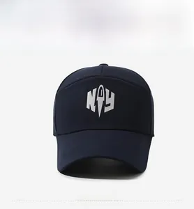 Detailed front view of navy blue baseball cap featuring silver NY logo embroidery