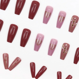 Coffin press-on nails set with deep wine red and pink tones featuring rhinestones and hearts
