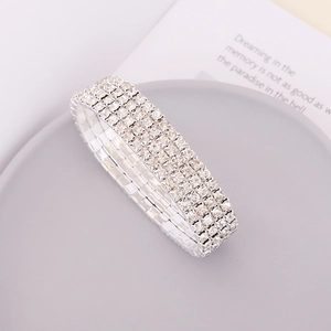 Detail of four-row full crystal rhinestone elastic bracelet in silver plating finish