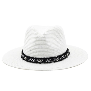 White straw sun hat with checkerboard ribbon and silver beads for beach vacations