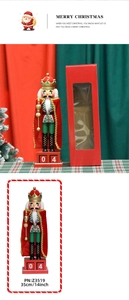Macro detail of wooden nutcracker advent calendar base with 04 date blocks and gift box