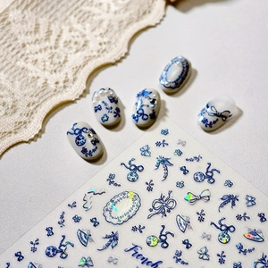 Blue floral 3D nail art stickers with laser holographic butterfly and bow designs