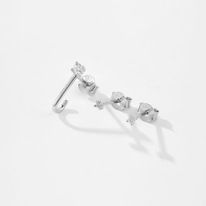 Minimalist S925 sterling silver J-hook earrings set with sparkling stones on white background