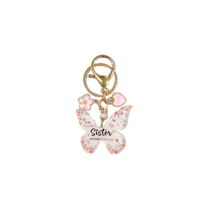 Détail du porte-clés papillon en acrylique avec gravure rose pour une sœur aimée
