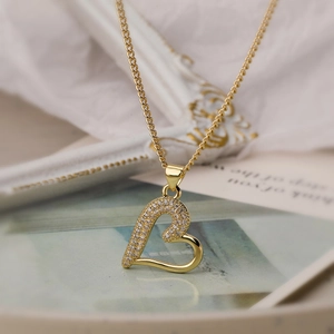 Elegant gold-plated heart pendant necklace with shimmering cubic zirconia micro-inlay