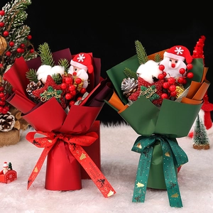Artificial Christmas bouquets with Santa doll, pine cones, and berries in gift bags