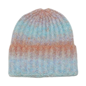 Detail of colorful tie-dye knit beanie showing soft mohair texture and ribbed pattern