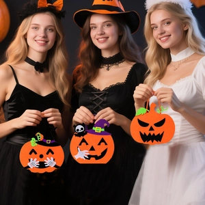 Three felt pumpkin bags with different Halloween faces held by models in a festive setting