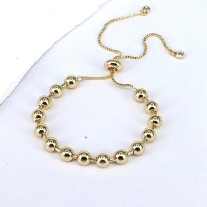 Minimalist gold bead slider bracelet for women with adjustable clasp and polished finish