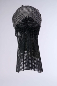 Detailed view of black fishnet turban with sparkling silver rhinestones for parties