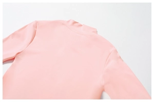Detail view of pink zipper sports jacket collar with high-quality flatlock stitching