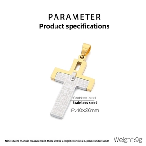Detail of gold and silver stainless steel cross pendant with engraved bible scripture