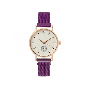 Detail of rose gold quartz watch with white dial and purple mesh metal strap