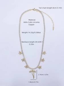 Detailed view of gold butterfly pendant with size measurements and zirconia setting