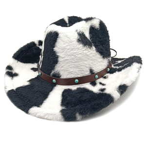 Western cowboy hat with black and white cow print plush and turquoise studded leather band