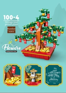 Detail of buildable kumquat bonsai tree kit showing dimensions and 443 puzzle pieces