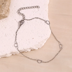 Silver stainless steel anklet with hollow heart charms and adjustable lobster clasp close-up
