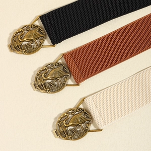 Elastic waist belts in black, brown and beige with vintage flamingo buckles