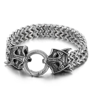 Close-up of vintage silver Viking wolf head bracelet with detailed Franco Link chain texture