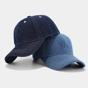 Vintage denim baseball caps in dark and light blue with contrast stitching detail