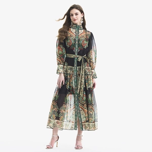 Long-sleeved vintage paisley print dress with lantern sleeves and ruffled hem details