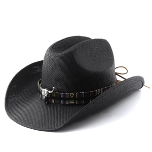 Classic black woven cowboy hat with ethnic strap and silver bull skull ornament