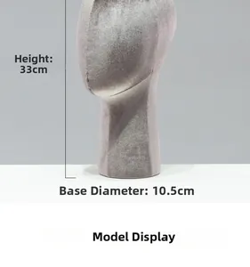 Detailed grey velvet mannequin head stand showing 33cm height and 10.5cm base diameter