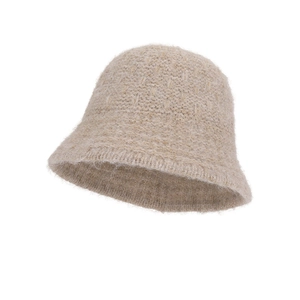 Winter thermal knit bucket hat for women featuring beige waffle texture and warm fuzzy material