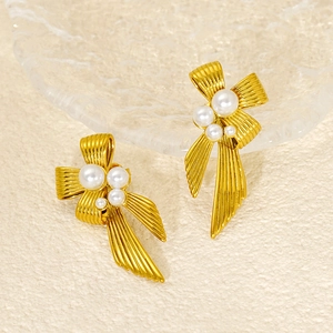 Elegant gold bow earrings with pearls and brushed texture for women in luxury style