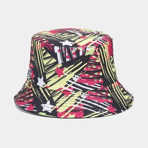 Detail shot of a double-sided bucket hat with vibrant 3D graffiti print and star patterns