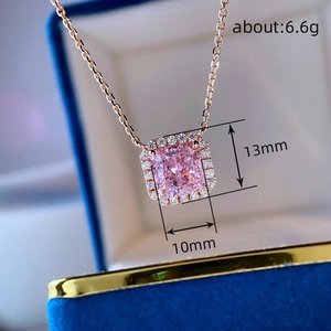 Detail of pink cushion-cut gemstone necklace in blue velvet box with 13mm size mark