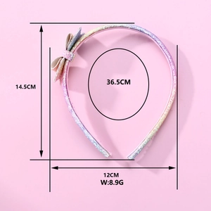 Rainbow sequin bow headband with 14.5x12cm dimensions for kids hair styling