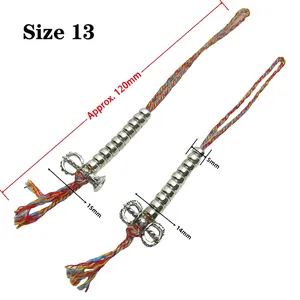 Detailed view of silver Tibetan Vajra bell charms with size measurements and woven cord