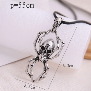 Detail view of silver skull spider pendant with 6.3cm height and 2.6cm width dimensions