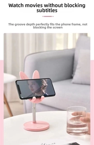 Close-up of pink rabbit phone stand with adjustable height and non-slip support groove