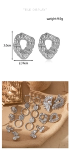 Detail showing dimensions of silver sun goddess earrings with 3.0cm height and 2.37cm width