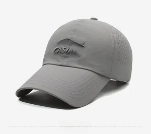 Detail of dark grey quick-dry baseball cap with CASUAL embroidery and laser-cut vents
