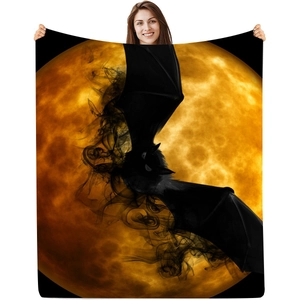 Macro shot of Halloween flannel blanket featuring black bat and yellow moon digital print