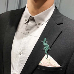 Elegant green crystal lizard brooch on black suit lapel with rhinestones for men and women